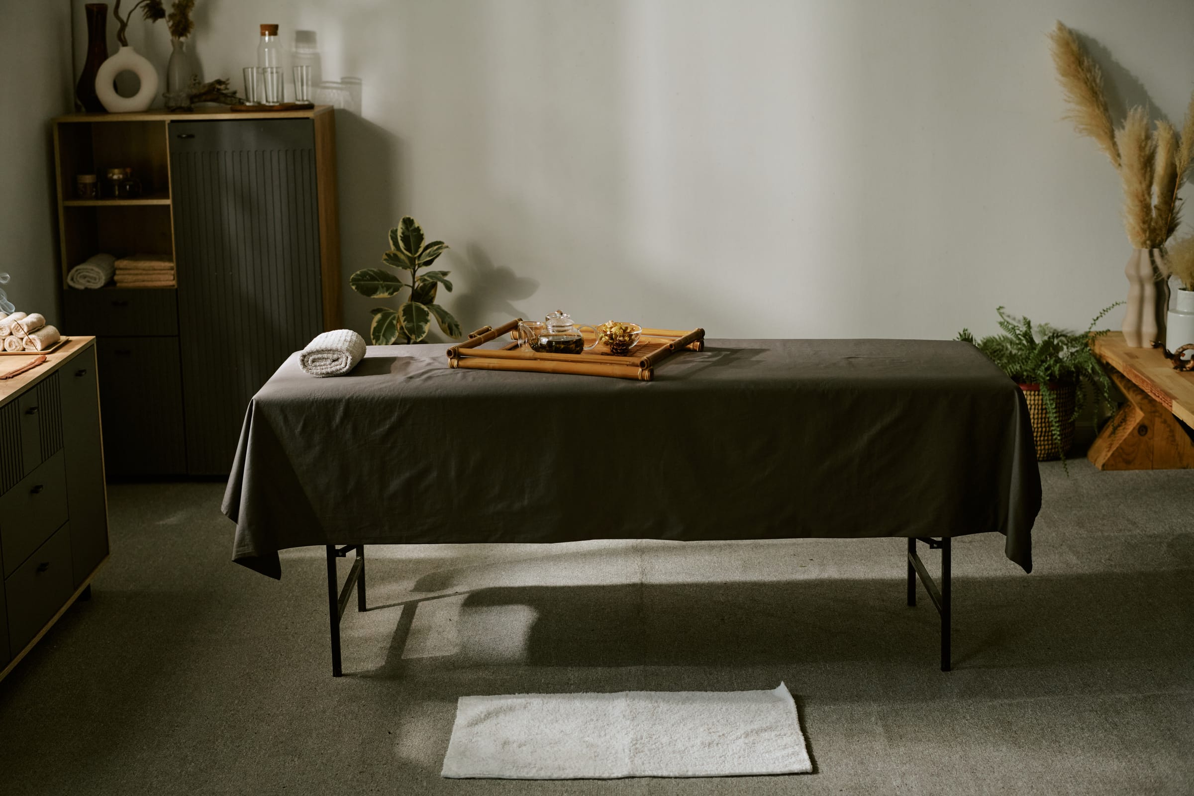 A massage table set in a quiet room